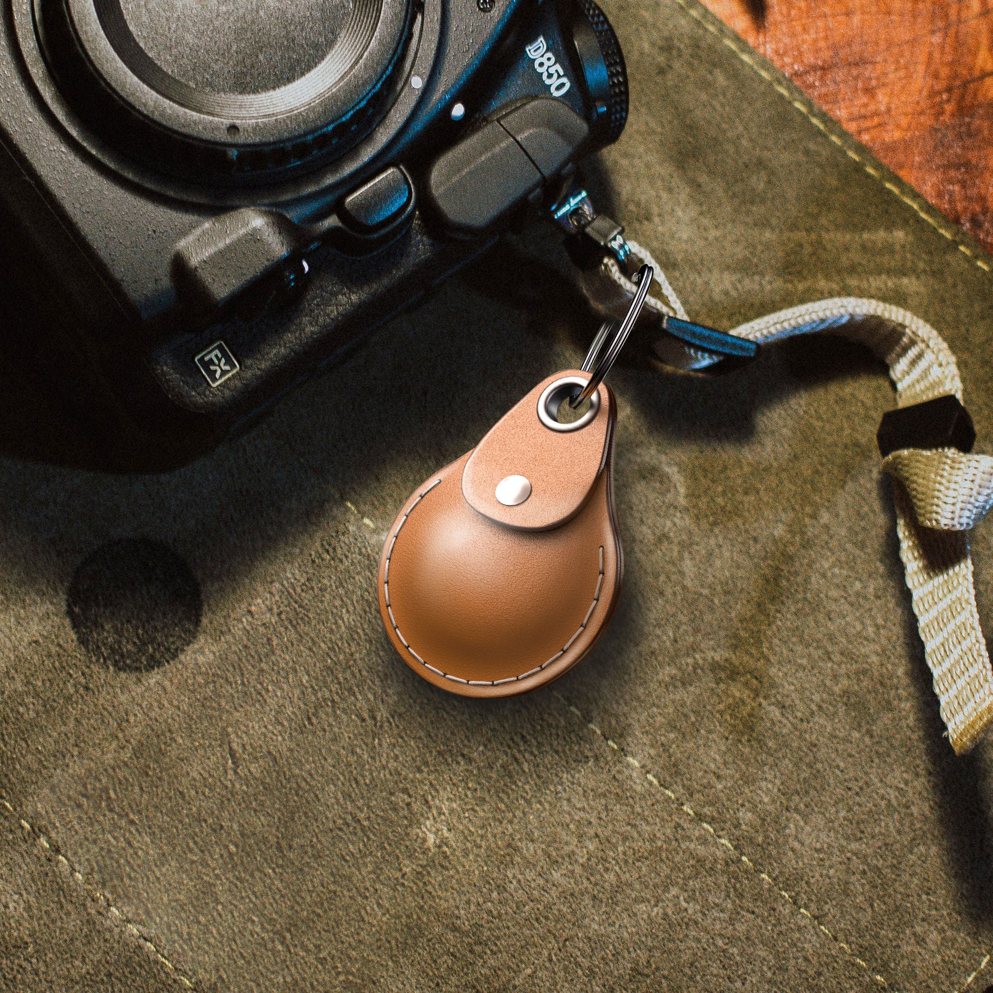 Camera with a AirTag leather keychain