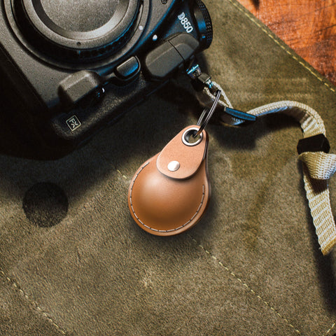 Camera with a AirTag leather keychain